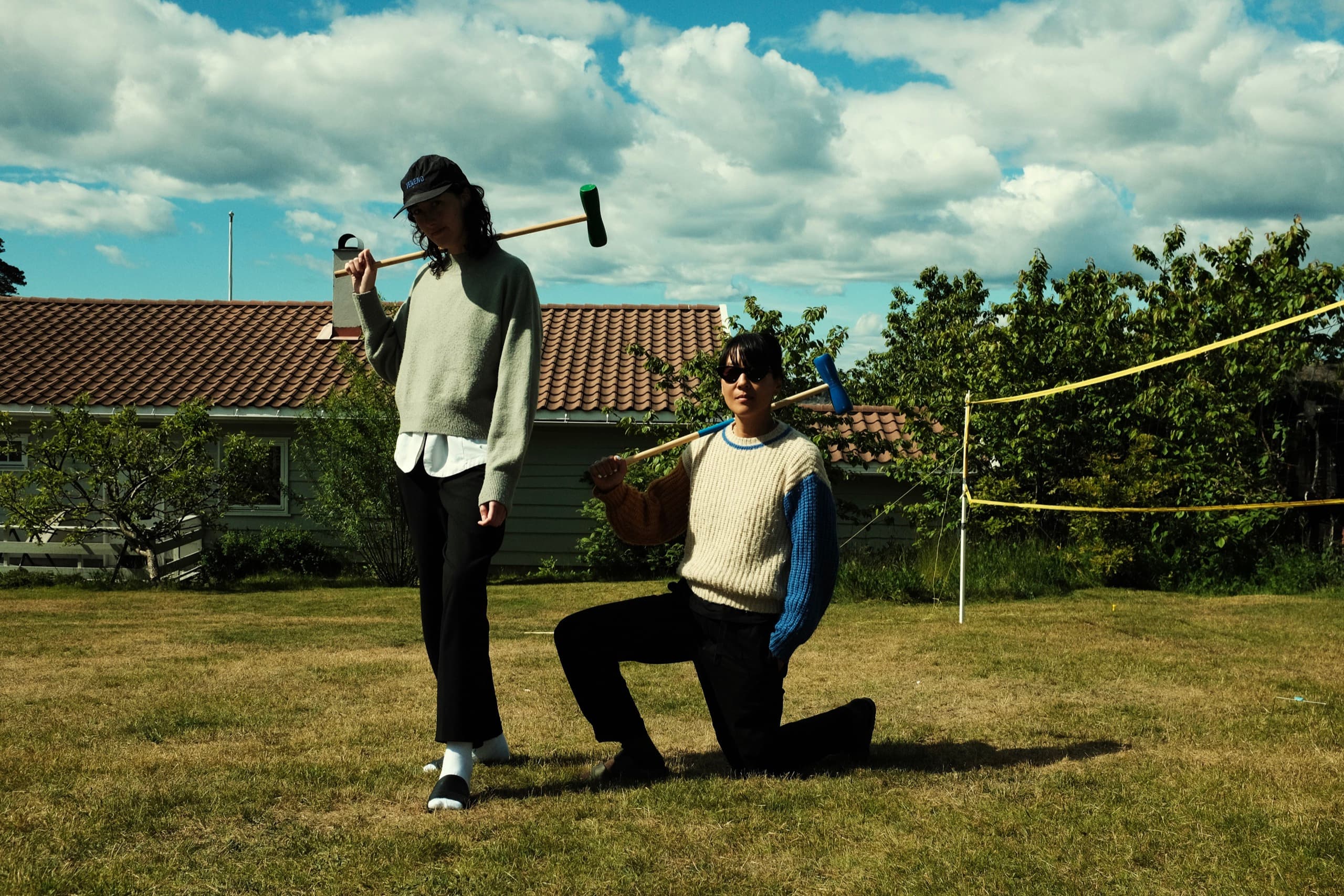 Sun Helen Kalvenes and Solenn Robic playing croquet